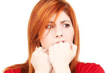 Image showing unhappy redhead woman