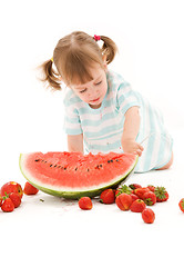 Image showing little girl with strawberry and watermelon