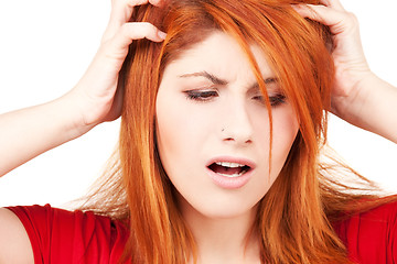 Image showing unhappy redhead woman