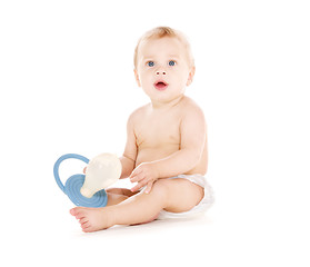 Image showing baby boy with big pacifier