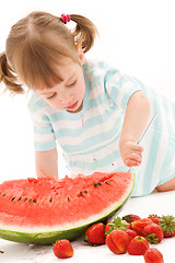 Image showing little girl with strawberry and watermelon