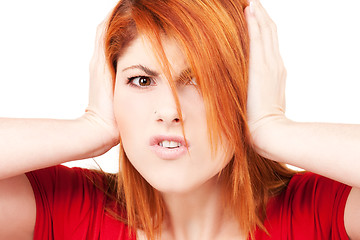 Image showing unhappy redhead woman