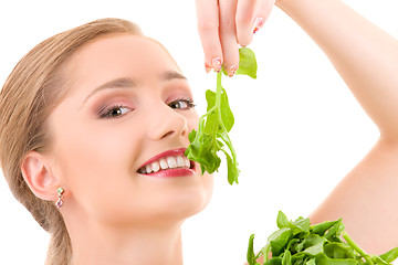 Image showing happy woman with spinach