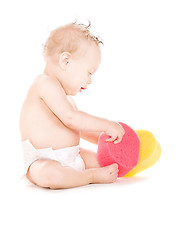 Image showing baby boy with sponges