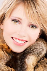 Image showing lovely teenage girl in fur