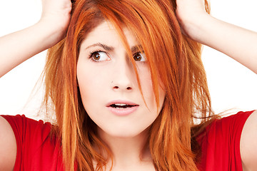 Image showing unhappy redhead woman