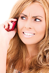 Image showing unhappy woman with cell phone