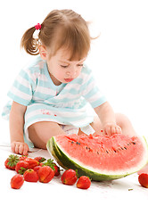 Image showing little girl with strawberry and watermelon