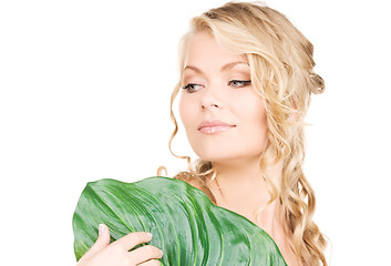 Image showing woman with green leaf