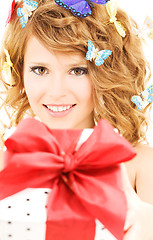 Image showing butterfly girl with gift
