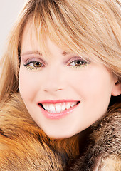 Image showing lovely teenage girl in fur