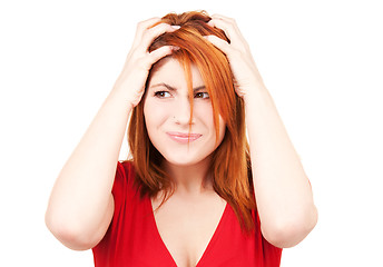 Image showing unhappy redhead woman