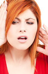 Image showing unhappy redhead woman