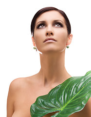 Image showing woman with green leaf