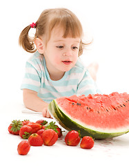 Image showing little girl with strawberry and watermelon