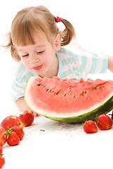 Image showing little girl with strawberry and watermelon