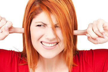 Image showing unhappy redhead woman