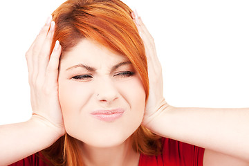 Image showing unhappy redhead woman