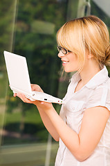 Image showing office girl with laptop computer