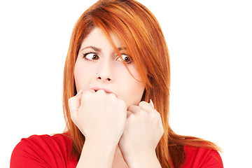 Image showing unhappy redhead woman