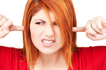 Image showing unhappy redhead woman