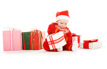 Image showing santa helper baby with christmas gifts