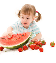 Image showing little girl with strawberry and watermelon