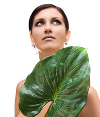 Image showing woman with green leaf