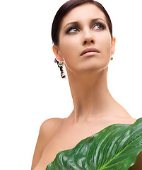 Image showing woman with green leaf