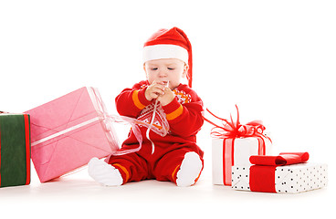 Image showing santa helper baby with christmas gifts