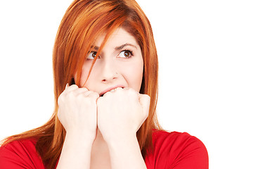 Image showing unhappy redhead woman