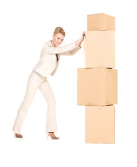 Image showing businesswoman with boxes