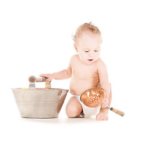 Image showing baby boy with wash-tub and scoop