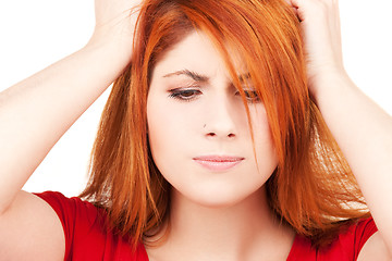 Image showing unhappy redhead woman