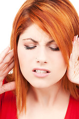 Image showing unhappy redhead woman