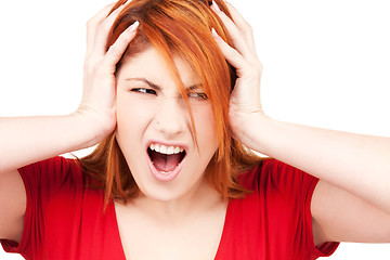 Image showing unhappy redhead woman