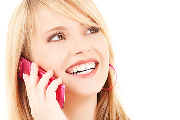 Image showing happy girl with pink phone