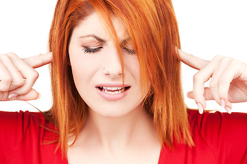 Image showing unhappy redhead woman