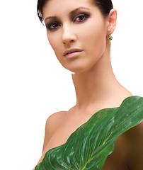 Image showing woman with green leaf