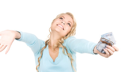 Image showing lovely woman with purse and money