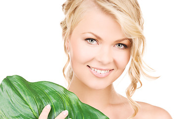 Image showing woman with green leaf