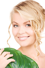 Image showing woman with green leaf