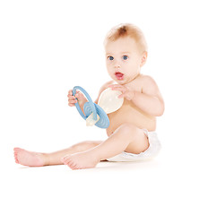 Image showing baby boy with big pacifier