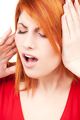 Image showing unhappy redhead woman