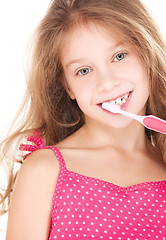 Image showing happy girl with toothbrush