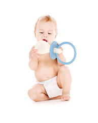 Image showing baby boy with big pacifier