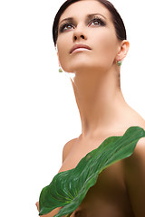 Image showing woman with green leaf