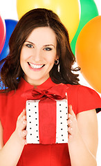 Image showing woman with gift box and balloons