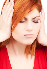 Image showing unhappy redhead woman