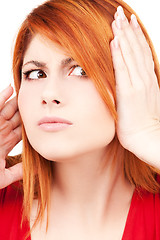 Image showing unhappy redhead woman